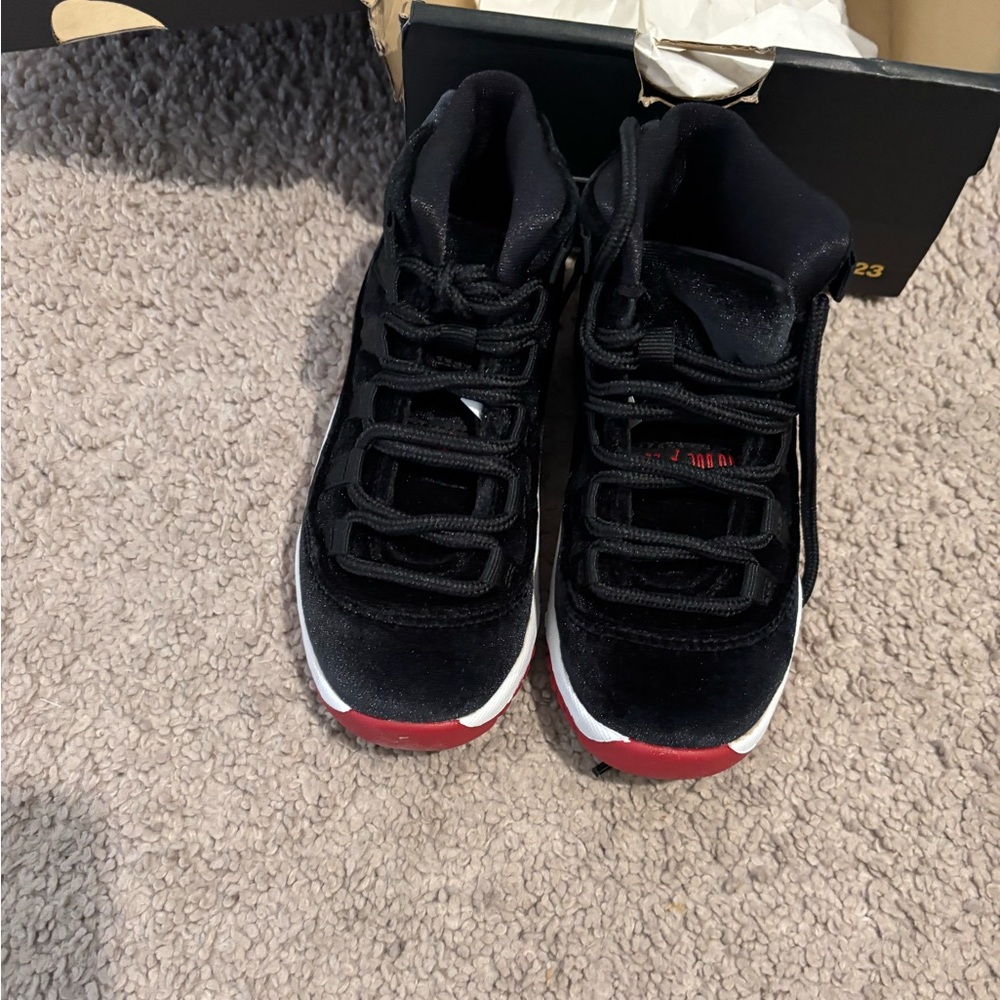 Kids Black and Red velvet Jordan 11’s